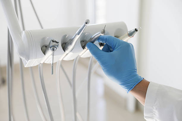 Professional Tooth Extraction technician working in Riverside, IL